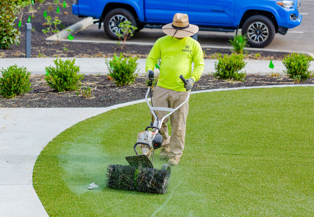 worker finishing turf